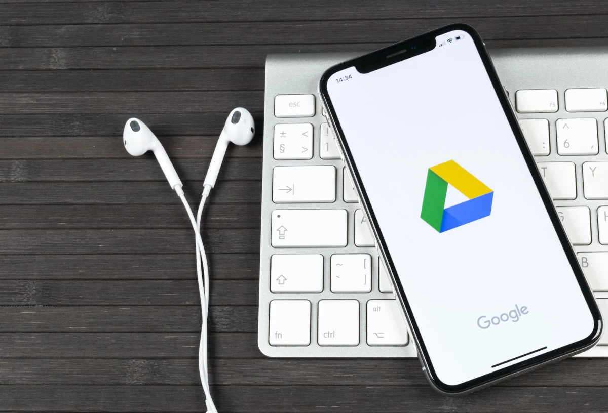 Google Drive application icon on Apple iPhone X screen close-up. Google drive icon. Google Drive application. Social media network